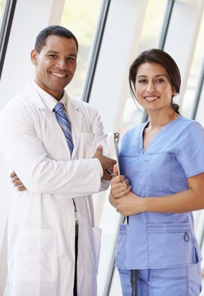 Monkey Business Images: Portrait Of Medical Staff In Corridor Of Modern Hospital