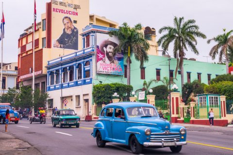 julianpetersphotography: Santiago de Cuba, Cuba - January 4, 2016: Santiago de Cuba is often referred to as birthplace of the Cuban revolucion. Posters of Fidel Castro advertise the revolution