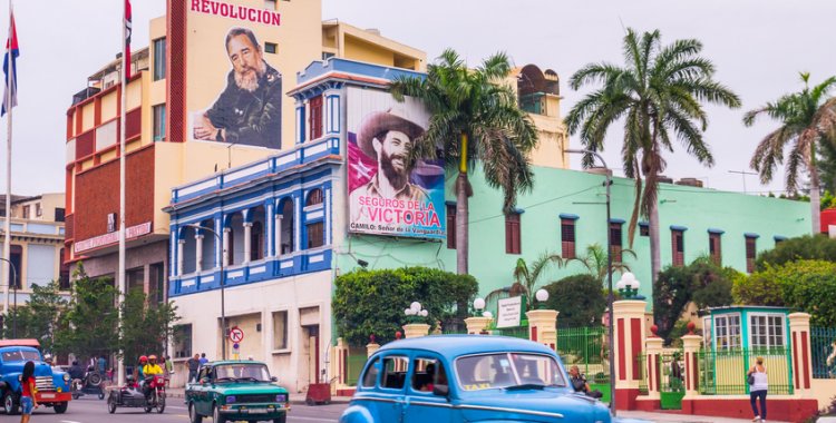 julianpetersphotography: Santiago de Cuba, Cuba - January 4, 2016: Santiago de Cuba is often referred to as birthplace of the Cuban revolucion. Posters of Fidel Castro advertise the revolution